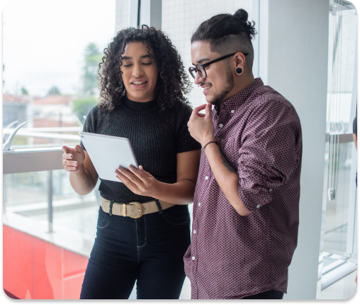 Two employees having a conversation at work